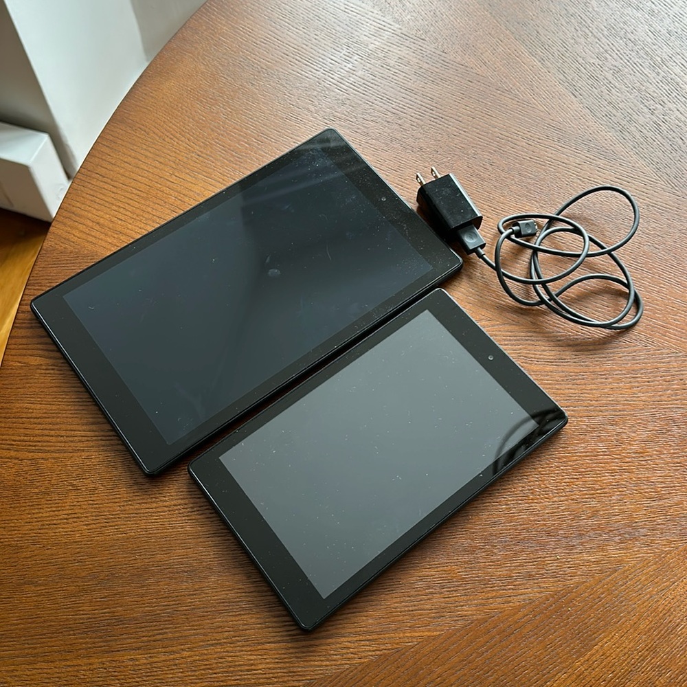 Two Amazon Fire tablets
